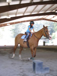 Claire riding Cookie on Gotcha Day (Aug. 17, 2010). Mommy and Daddy took her for a horse-riding lesson.