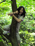 Claire at the Woodland Park Zoo. Tree climbing fun!